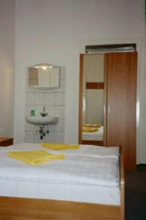 Chambre Triple avec Salle de Bains Commune