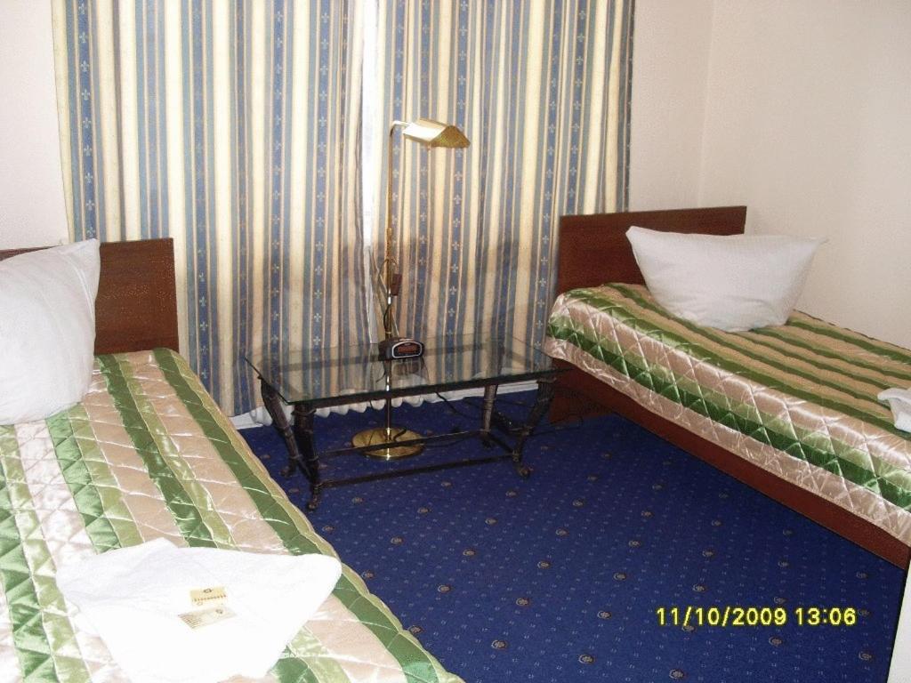 Chambre Familiale Économique (2 Adultes + 1 Enfant)