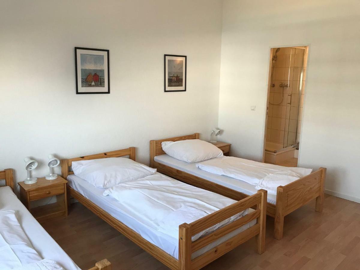 Chambre Triple avec Cuisine Commune